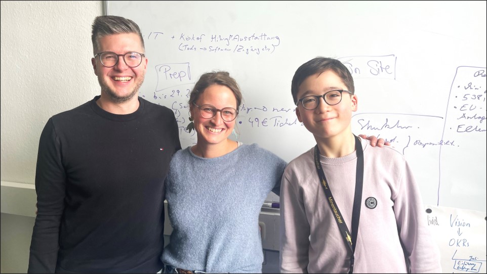 High school student Tim with Sophie and Marten during his visit at north.io for Boys' Day.